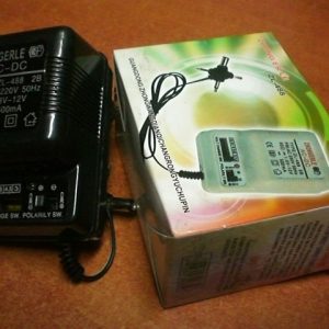 Адаптор AC-DC 3 - 12 V.